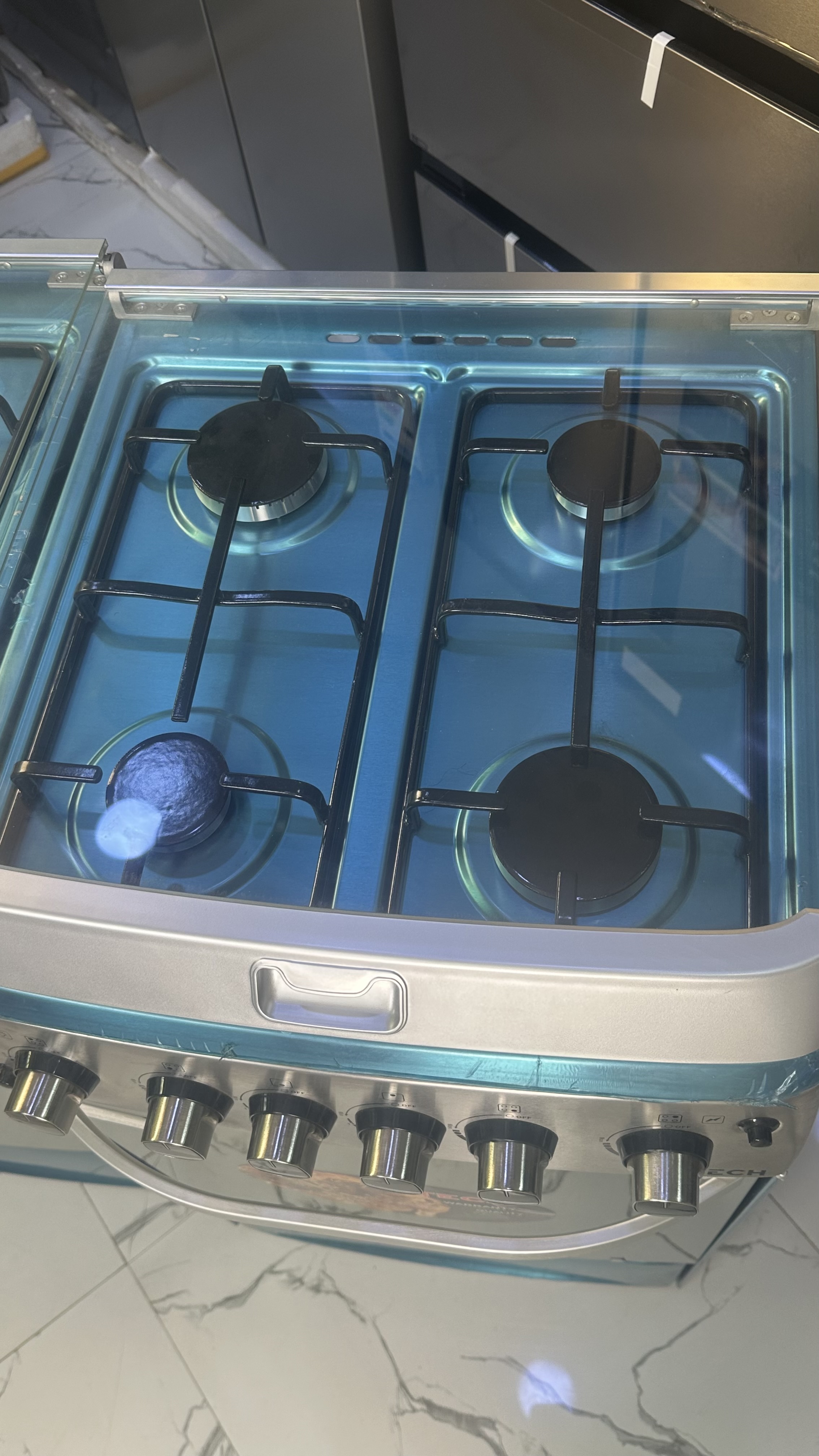 Cuisinière 4 feu 50x50